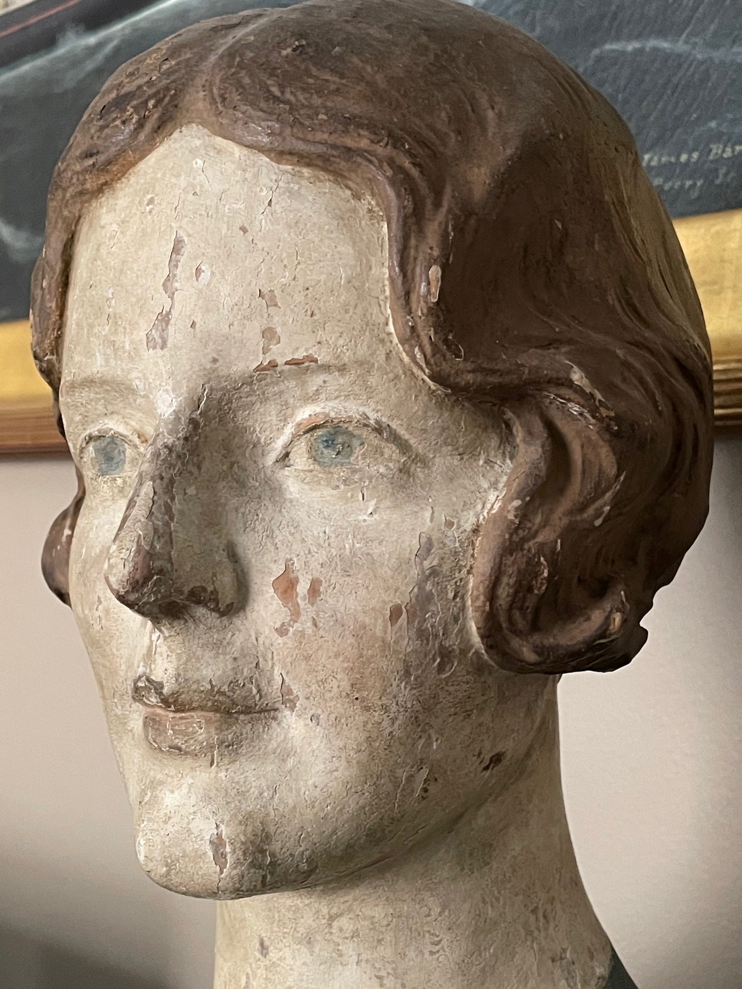 carved portrait bust of a lady rel=