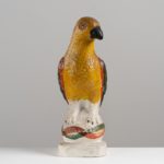 antique painted chalkware parrot