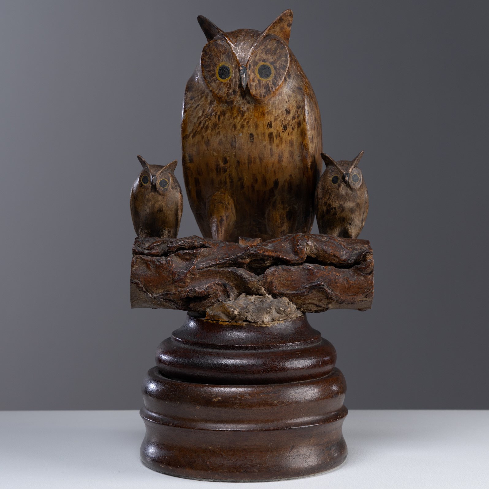 carved folk art owl rel=