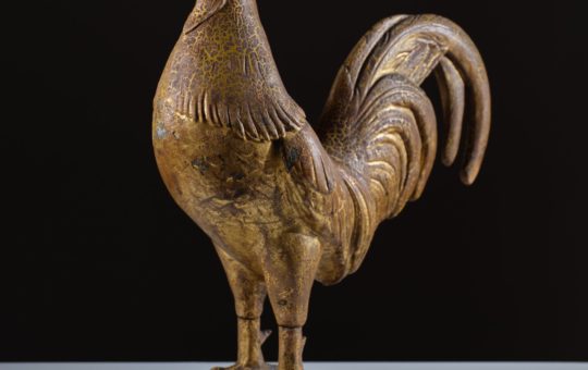 antique cast metal rooster