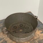 antique punched tin colander