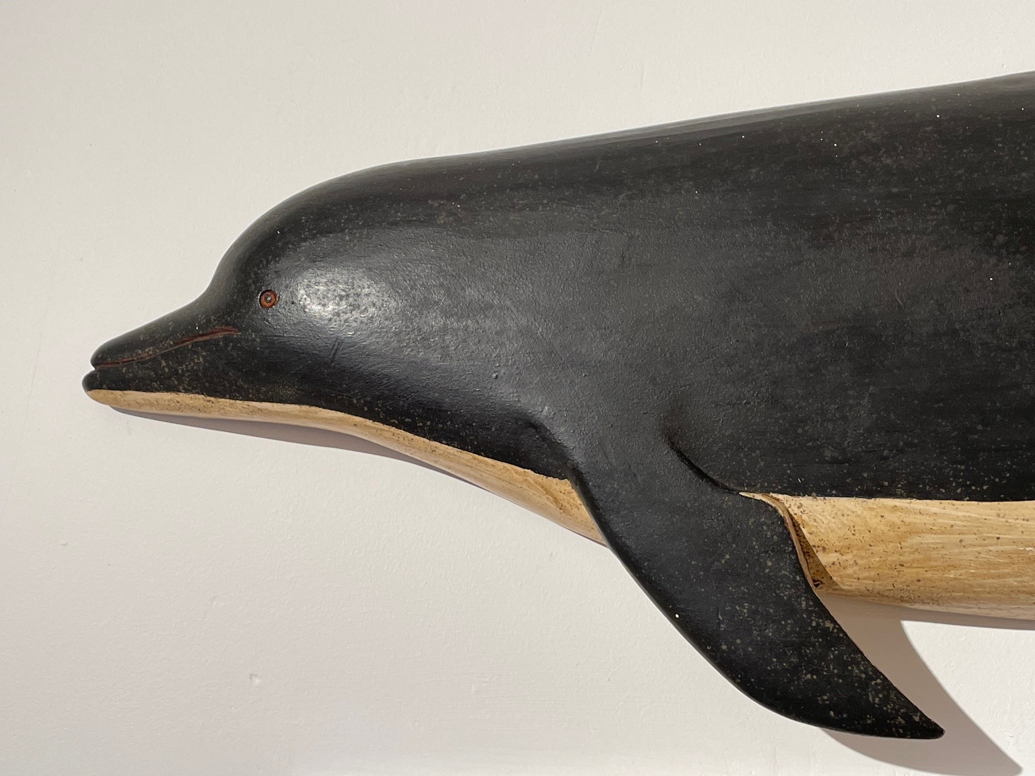 Clark Vorhees carved dolphins rel=