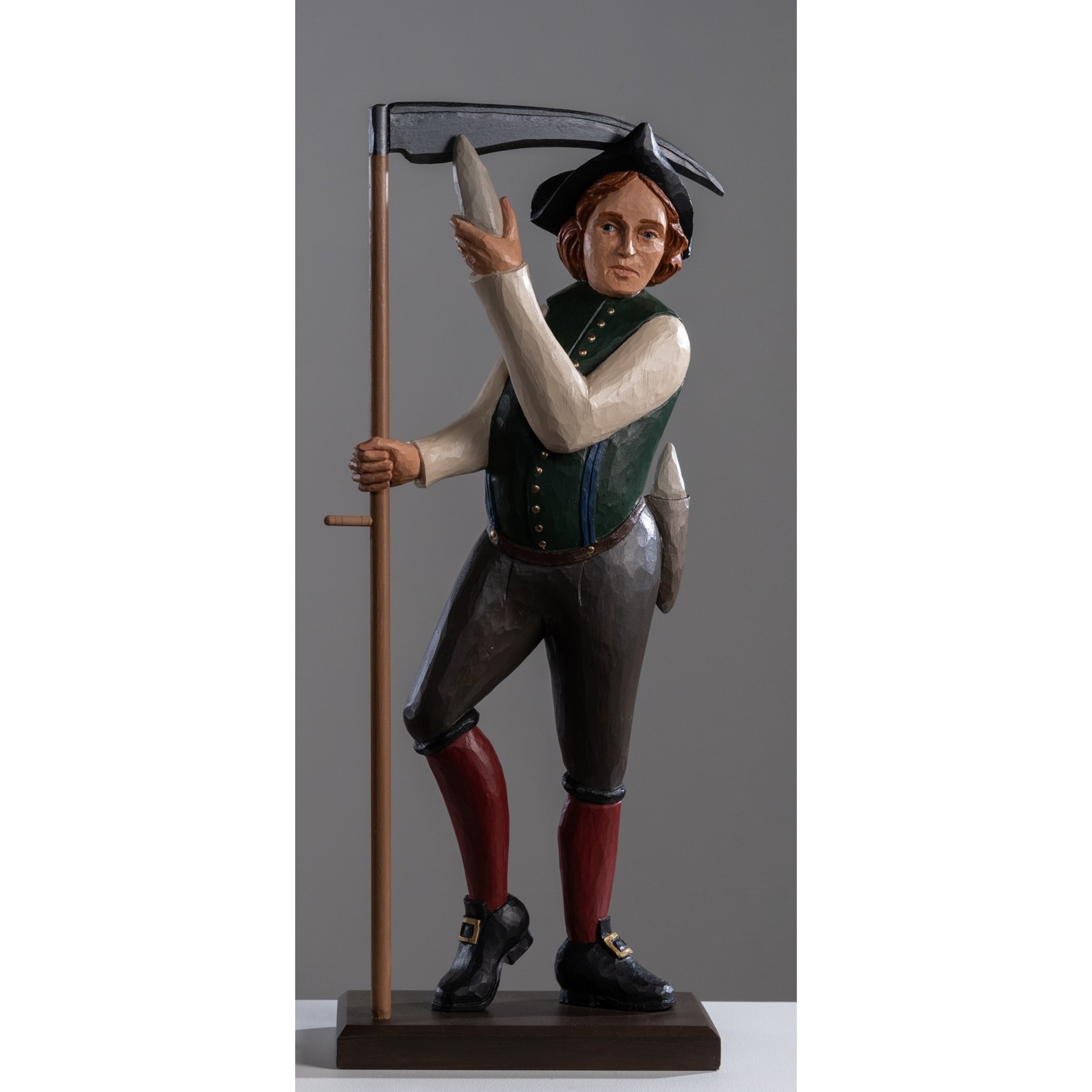 Marshall Rumbaugh carved figure rel=