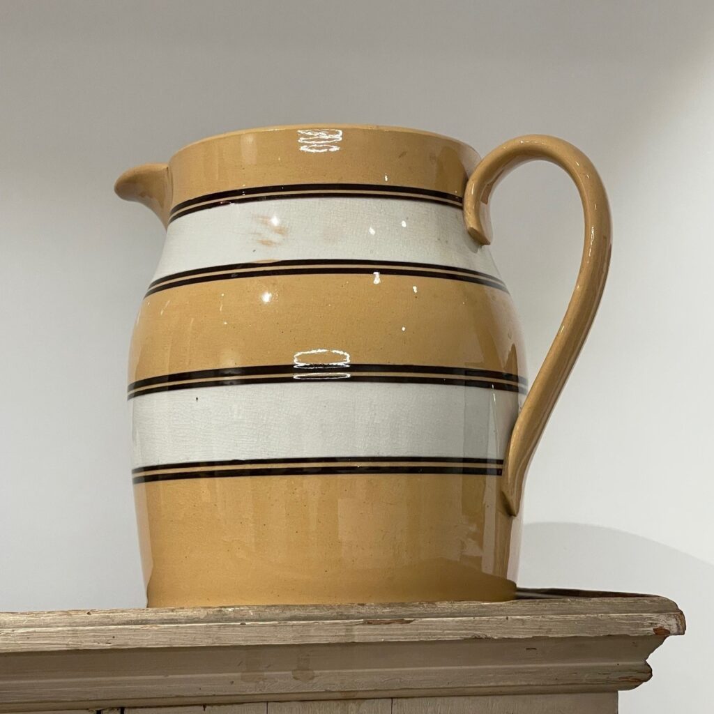 antique banded yellowware pitcher