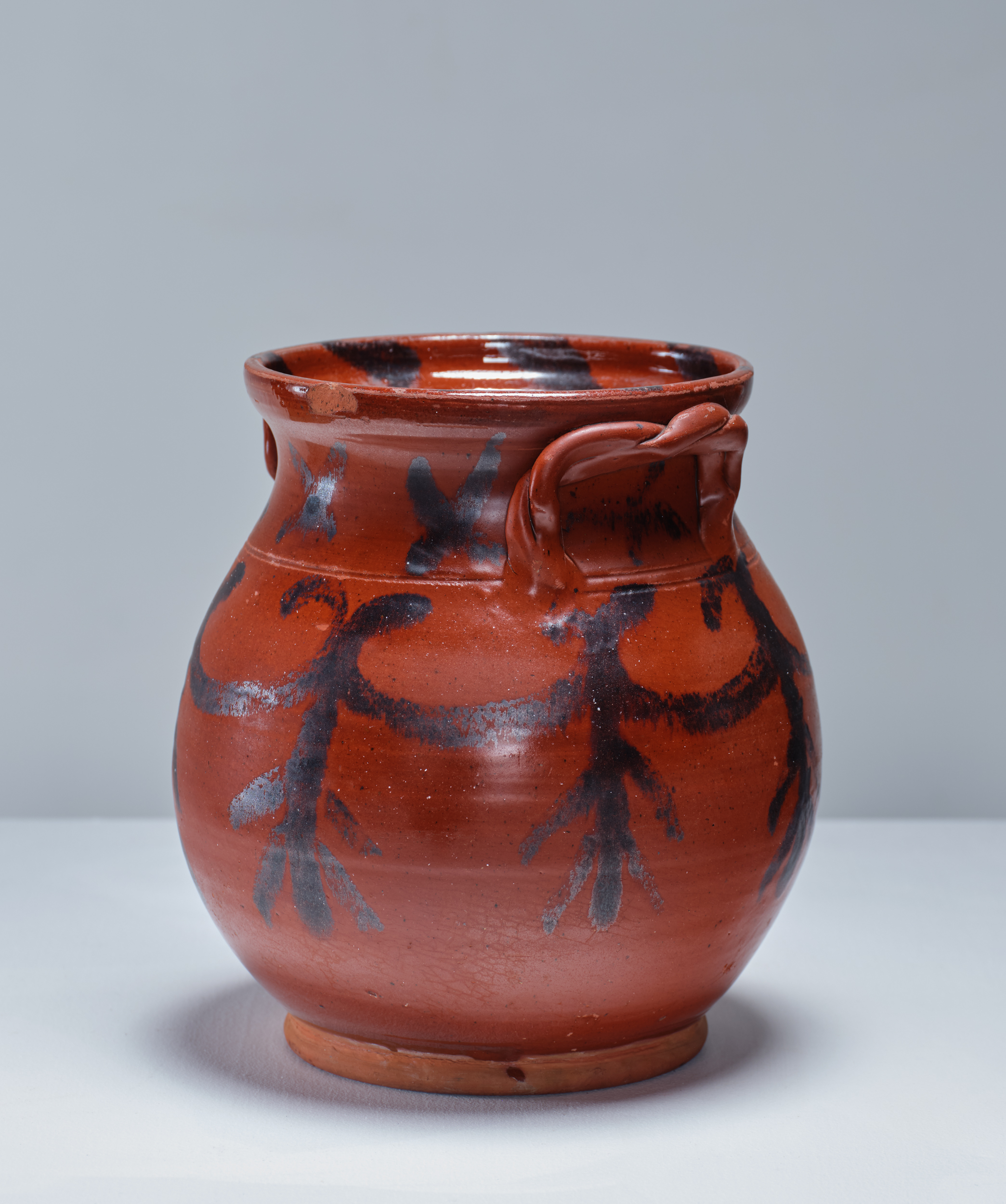 manganese decorated redware jar rel=
