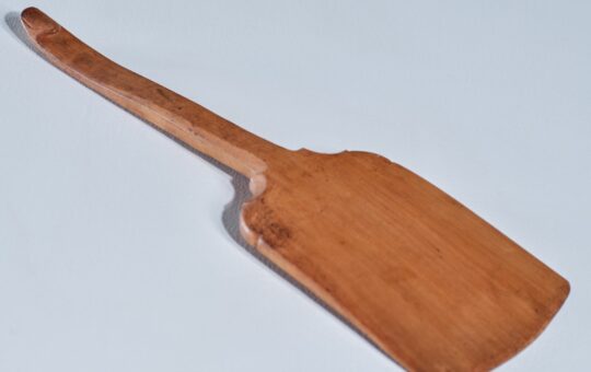 antique carved butter paddle