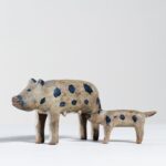 antique painted pig carvings