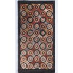 antique hooked rug with circles