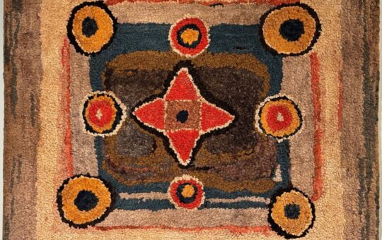 primitive geometric hooked rug