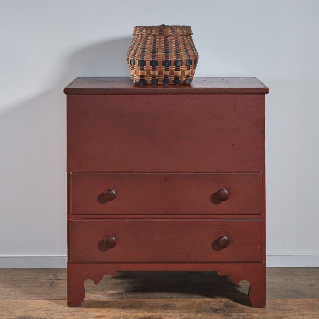 red lift-top chest