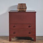 red lift-top chest