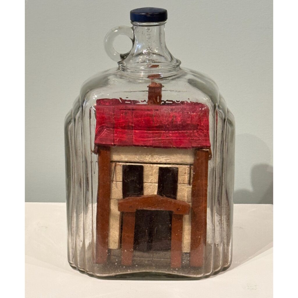 antique house in bottle