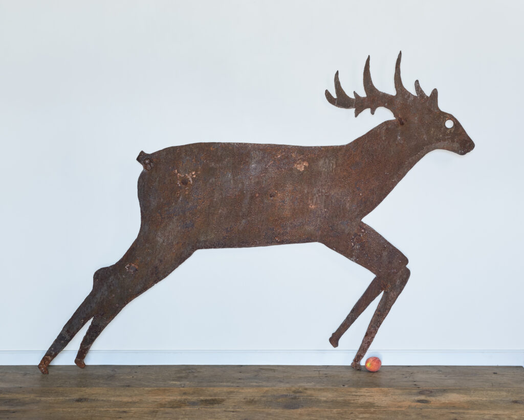 antique iron leaping stag