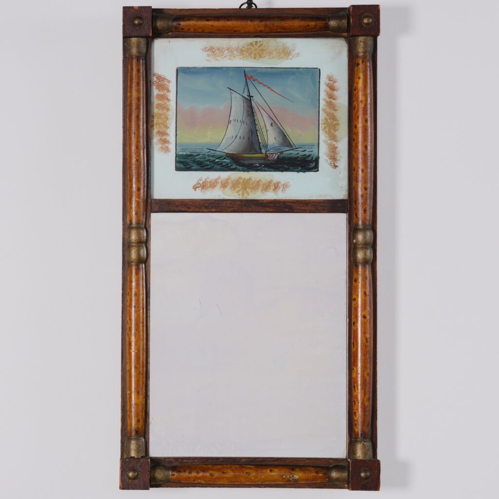 antique eglomise mirror with sailboat
